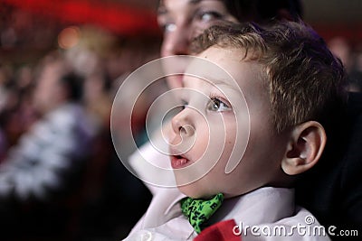 Astonished child at circus Stock Photo