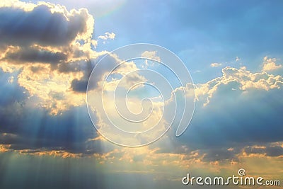 Astonishing blue sky with colorful white clouds. Abstract sun beam line light shining through the clouds. Stock Photo