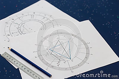Astrological natal chart on a blue background Stock Photo