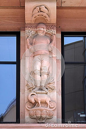 The astrological sign of Capricorn, relief on house facade in Aschaffenburg, Germany Editorial Stock Photo