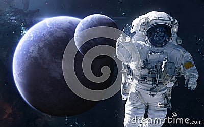 Astronaut on background of exoplanets in deep space. Science fiction Stock Photo