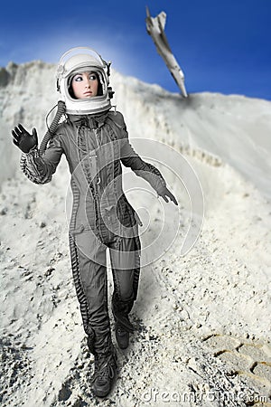 Astronaut fashion stand woman space suit helmet Stock Photo