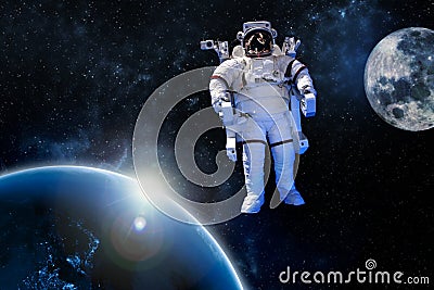Astronaut float in the space in weightlessness near to planet earth Stock Photo
