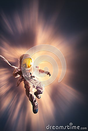 Astronaut floating in the atmosphere Stock Photo