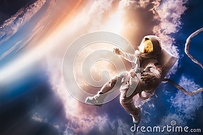 Astronaut floating in the atmosphere Stock Photo