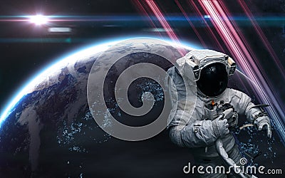 Astronaut in outer space. Distant habitable planet in light of bright star Stock Photo