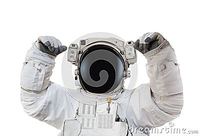 Astronaut in space suit rises hands up Stock Photo