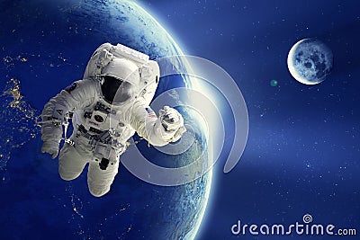 Astronaut or Spaceman floating in space with Earth planet and moon background Editorial Stock Photo