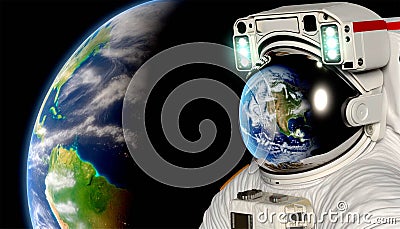 An astronaut in a spacesuit looks at the ground. Stock Photo