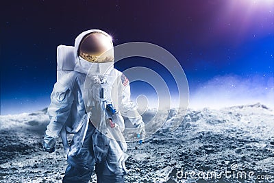 Astronaut walking on the moon Stock Photo