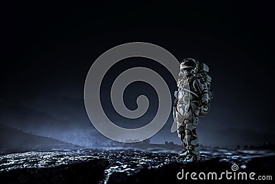 Astronaut walking on an unexplored planet Stock Photo