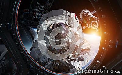 Astronaut working on a space station 3D rendering elements of th Stock Photo