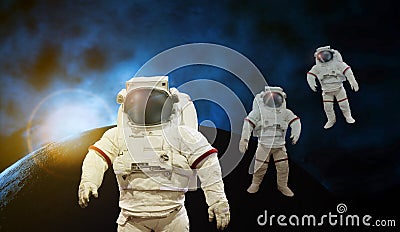 Astronaut working on space with sun light with earth and cosmos Stock Photo