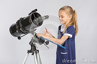 Astronomer happily looks records with observations Stock Photo
