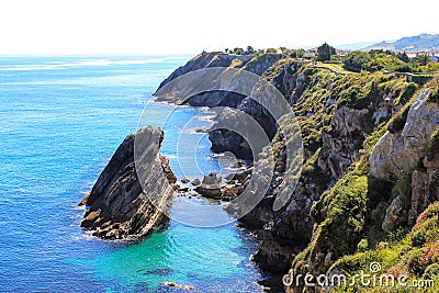 Asturian cliff and rock in Llanes Stock Photo