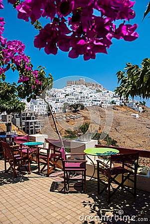 View of Astypalaia island from a colorful cafe. Stock Photo