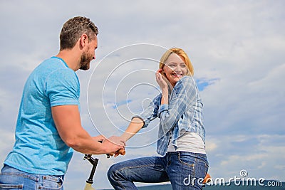 asual acquaintance concept. Man with beard and shy blonde girl on first date. Woman feels shy in company with attractive Stock Photo