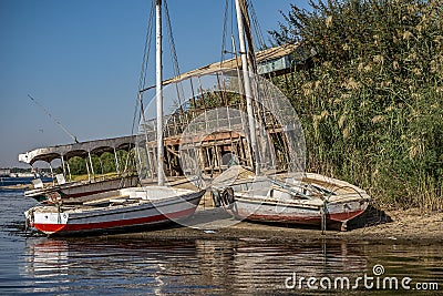 12.11.2018 Aswan, Egypt, abandoned boats on a small island in the middle of a nail Editorial Stock Photo