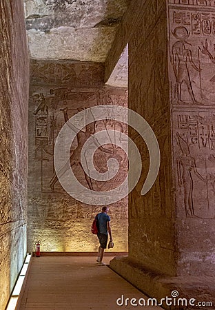 Aswan, Egypt - 2019-04-29 - Abu Simbel temple statues and hierglyphs Editorial Stock Photo