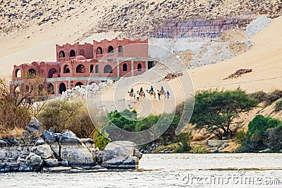 Aswan, Egypt, River nile, rocks, trees, sand, camels Stock Photo