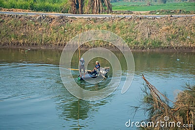 Aswan, Egypt, 24th of December 2018: Daily life on the riverside Nile in Egypt. Poor people living Editorial Stock Photo