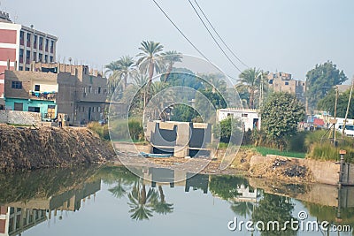 Aswan, Egypt, 24th of December 2018: Daily life on the riverside Nile in Egypt. Poor people living Stock Photo