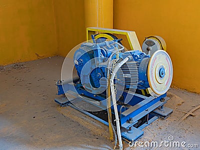 Asynchronous Electric Motor, Gearbox, Braking Device, Pulley, Protective Cover, Flywheel and V-Belt Transmission, Used for The Stock Photo