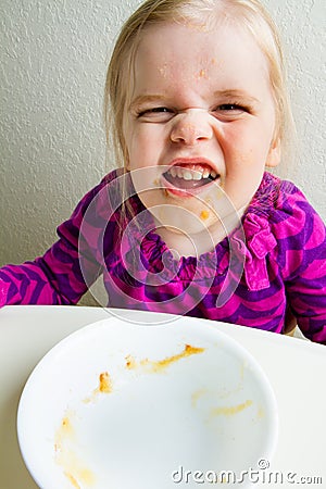 She ate it all Stock Photo