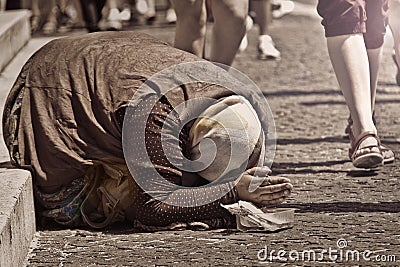 ATENAS, GREECE - Jan 21, 2015:PHOTO OF WOMAN ASKING FOR MONEY Editorial Stock Photo