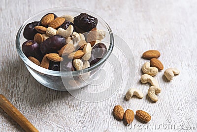 Ates and nuts in plate Stock Photo