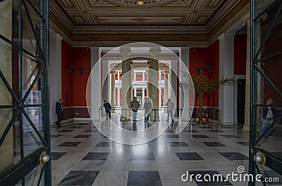 Athens, Attica / Greece - Mar 10, 2013: Entering into the Zappion Hall neo classical building, the black and white marbled floor a Editorial Stock Photo