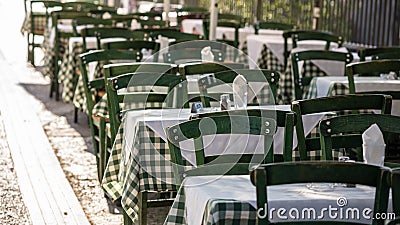 Athens, Greece. Greek tavern empty tables and chairs at Plaka. Stock Photo