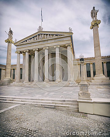 Athens Greece, the national academy neoclassical building with Athena and Apollo statues, slight vignetting Stock Photo