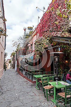 Cafes and restaurants in the scenic streets of Plaka, Athens, Greece Editorial Stock Photo