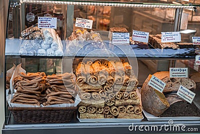 Traditional Greek snacks and pastry products on a shop window in Athens, Greece Editorial Stock Photo