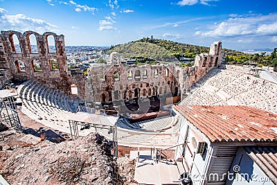 Odeon of Herodes Atticus with tourists looking at it Stock Photo