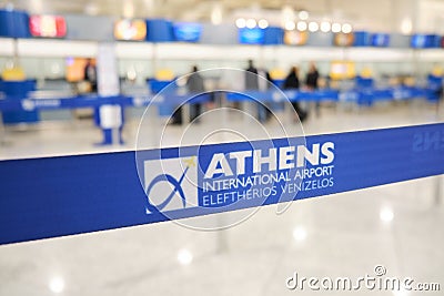 Athens International Airport Eleftherios Venizelos, Greece: Retractable belt, portable ribbon barrier, fencing tape. Editorial Stock Photo