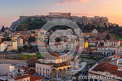 Athens old town and the Parthenon Temple of the Acropolis at sunset. Stock Photo