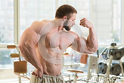 Athlete in gym. Stock Photo