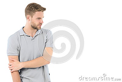 Athlete injured elbow joint. Man suffers old trauma chronic pain elbow white background. Sportsman risks taker Stock Photo