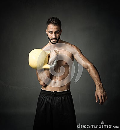 Athlete with kettleball Stock Photo