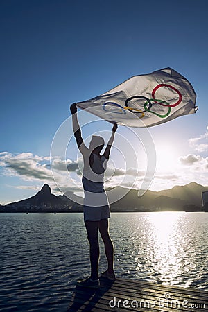 Athlete with Olympic Flag Lagoa Sunset Rio de Janeiro Brazil Editorial Stock Photo