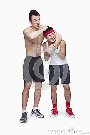 Athlete teasing athlete Stock Photo