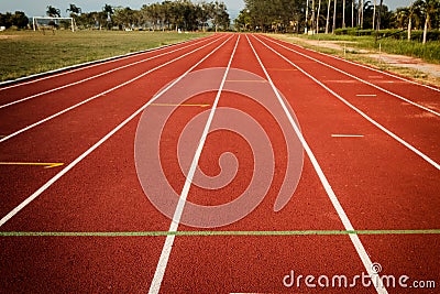 Athlete track or running track,Rubber granules red background,For outdoor exercise Stock Photo