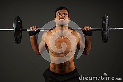 Athlete young man exercises Stock Photo