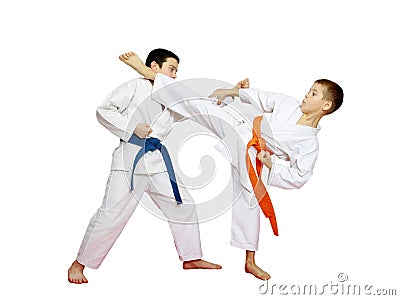 Athletes in kimono are training karate technique Stock Photo