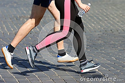 Athletes run marathons on the pavement Stock Photo