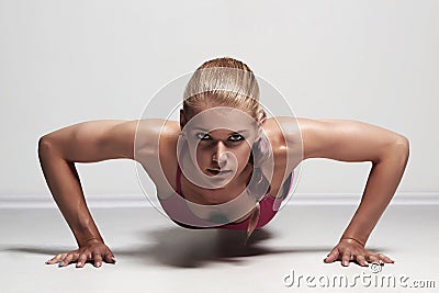 Athletic girl.muscular fitness woman doing exercise Stock Photo