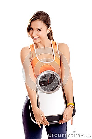 Athletic girl with a scale Stock Photo