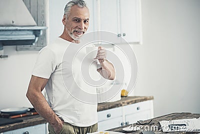 Athletic man drinking tea in the morning Stock Photo